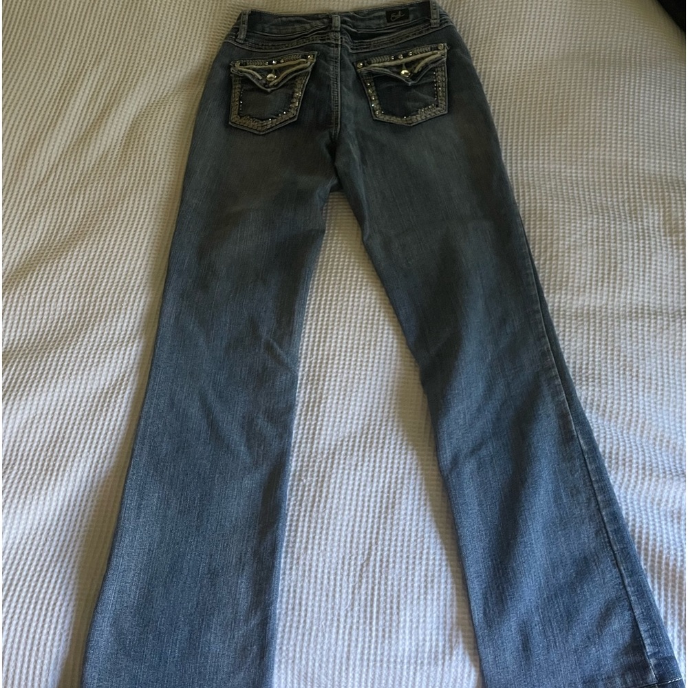 Low rise women’s y2k jeans with gems on the pockets